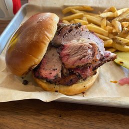Yampa River Icehouse signature dishes Brisket SandwichFull Rack RibsPulled Pork Sammie